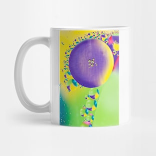 Colorful close up of oil drops in water Mug